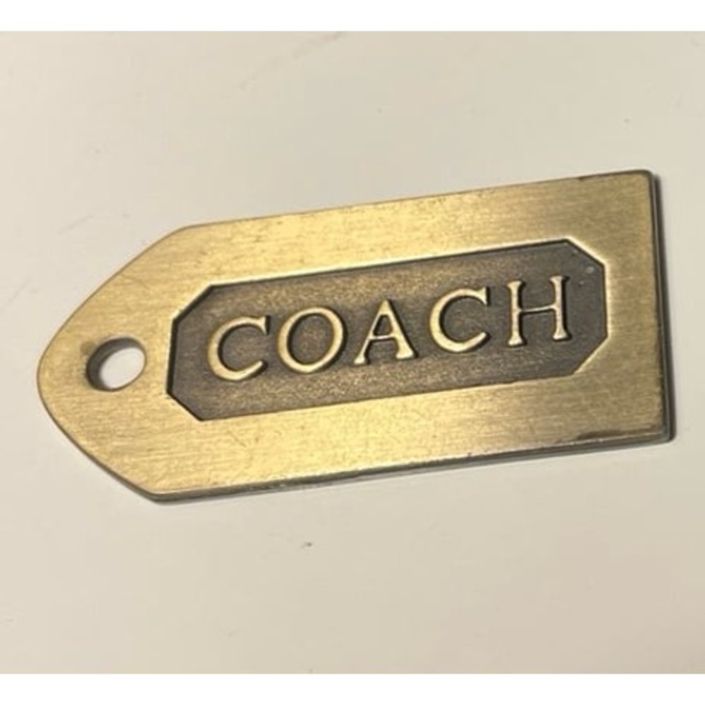 Vintage coach brass hang tag